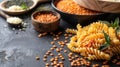 Assorted pasta and lentils with fresh basil on a dark background Royalty Free Stock Photo