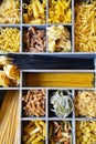 Assorted pasta in wooden boxes Royalty Free Stock Photo