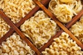 Assorted pasta in wooden compartments