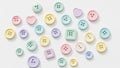 Assorted pastel colored buttons are scattered on a white background Royalty Free Stock Photo