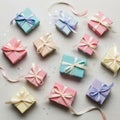Assorted pastel-colored gift boxes are arranged on a light wooden surface Royalty Free Stock Photo