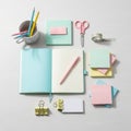 Assorted pastel-colored stationery items are neatly arranged on a light surface. An Royalty Free Stock Photo