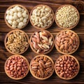 Assorted peeled nuts on wooden table background, top view Royalty Free Stock Photo