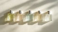 Assorted perfume bottles displayed flat lay, highlighting elegant fragrances for daily self-care Royalty Free Stock Photo