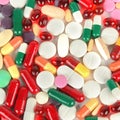 Assorted pharmaceutical medicine pills, tablets and capsules background.