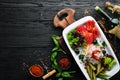 Assorted pickled vegetables on a plate. Ukrainian cuisine. Restaurant dishes. Top view.