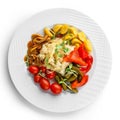 Assorted pickled vegetables with sauerkraut cabbage, peppers, cucumbers, tomatoes, mushrooms on plate isolated on white background