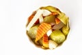 Assorted pickles vegetables carrot, chili, radish in white ceramic bowl. Top view. Isolated. Copy space. Top view