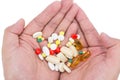 Assorted pills on hand Royalty Free Stock Photo