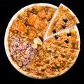 Assorted pizza with different fillings on light background. Top