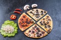 Assorted pizza slices. Margherita, pepperoni, four cheese pizza. Top view. Different types of pizza on the textured old Royalty Free Stock Photo