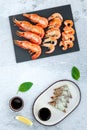 Assorted plate of fresh raw king prawn and boiled jumbo shrimps Royalty Free Stock Photo