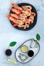 Assorted plate of fresh raw king prawn and boiled jumbo shrimps Royalty Free Stock Photo