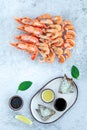 Assorted plate of fresh raw king prawn and boiled jumbo shrimps Royalty Free Stock Photo