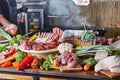 Assorted Raw Meats and Vegetables on Display Royalty Free Stock Photo