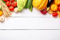 Assorted raw organic fresh vegetables on white wooden table. Fresh garden vegetarian food. Autumn seasonal image of farmer table Royalty Free Stock Photo