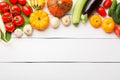 Assorted raw organic fresh vegetables on white wooden table. Fresh garden vegetarian food. Autumn seasonal image of farmer table Royalty Free Stock Photo