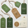 Assorted rectangular tags with a plant theme are arranged on a light surface. They Royalty Free Stock Photo