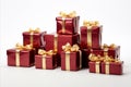 assorted red and white gift wrapped presents with red and gold ribbon bows on white background Royalty Free Stock Photo