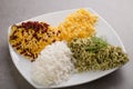 Assorted rice, biryani, pulao, fried and plain rice served in dish isolated on grey background top view of arabic food Royalty Free Stock Photo