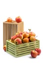 Assorted ripe apples in wooden boxes