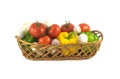 Assorted ripe vegetables in wicker basket isolated closeup