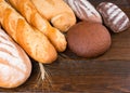 Assorted rye and white breads on table Royalty Free Stock Photo