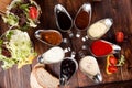 Assorted sauces: ketchup, perigueux, lesser, soy sauce, pesto, berry sauce, bechamel in beautiful aluminum sauceboats