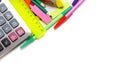 Assorted school supplies, including pens, pencils, scissors, glue and a ruler, on a white background Royalty Free Stock Photo