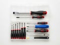 Assorted screwdriver set with various tips and handles Royalty Free Stock Photo