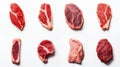 Assorted selection of fresh raw steaks, top view, isolated on a clean white background