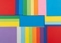 Assorted sheets of colored paper arranged in a grid-like pattern. Royalty Free Stock Photo