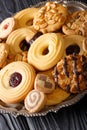 Assorted shortbread cookie close-up on a plate. vertical