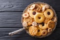 Assorted shortbread cookie close-up on a plate. vertical view fr