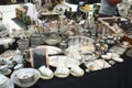 Gdansk / Poland - August 2 2019: Assorted silverware, glassware and crockery dishes on a table at a flea market