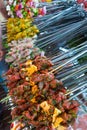 Assorted skewers with meat, fish and vegetables