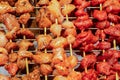 Assorted skewers meat seasoned vertical wooden skewers Royalty Free Stock Photo