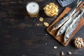 Assorted snacks for beer, dried fish. Royalty Free Stock Photo