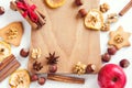 Assorted spices, nuts on cutting board Royalty Free Stock Photo