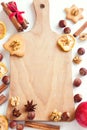 Assorted spices, nuts on cutting board Royalty Free Stock Photo