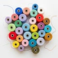 A few loose threads extend from the spools adding slight movement to the image Royalty Free Stock Photo