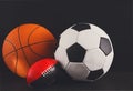 Assorted sport balls on black background Royalty Free Stock Photo