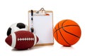 Assorted sports balls with a Clipboard Royalty Free Stock Photo