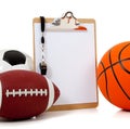 Assorted sports balls with a Clipboard Royalty Free Stock Photo