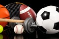 Assorted sports equipment on black Royalty Free Stock Photo