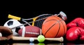 Assorted sports equipment on black Royalty Free Stock Photo