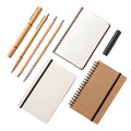 Assorted Stationery Items Including Pens Notebooks and Notepads on White writing office Royalty Free Stock Photo
