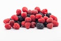 Assorted summer fruits heap on white