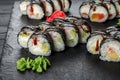 Assorted sushi nigiri and maki big set on slate. A variety of Japanese sushi with tuna, crab, salmon, eel and rolls Royalty Free Stock Photo