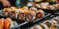 Assorted sushi rolls in takeout containers Royalty Free Stock Photo